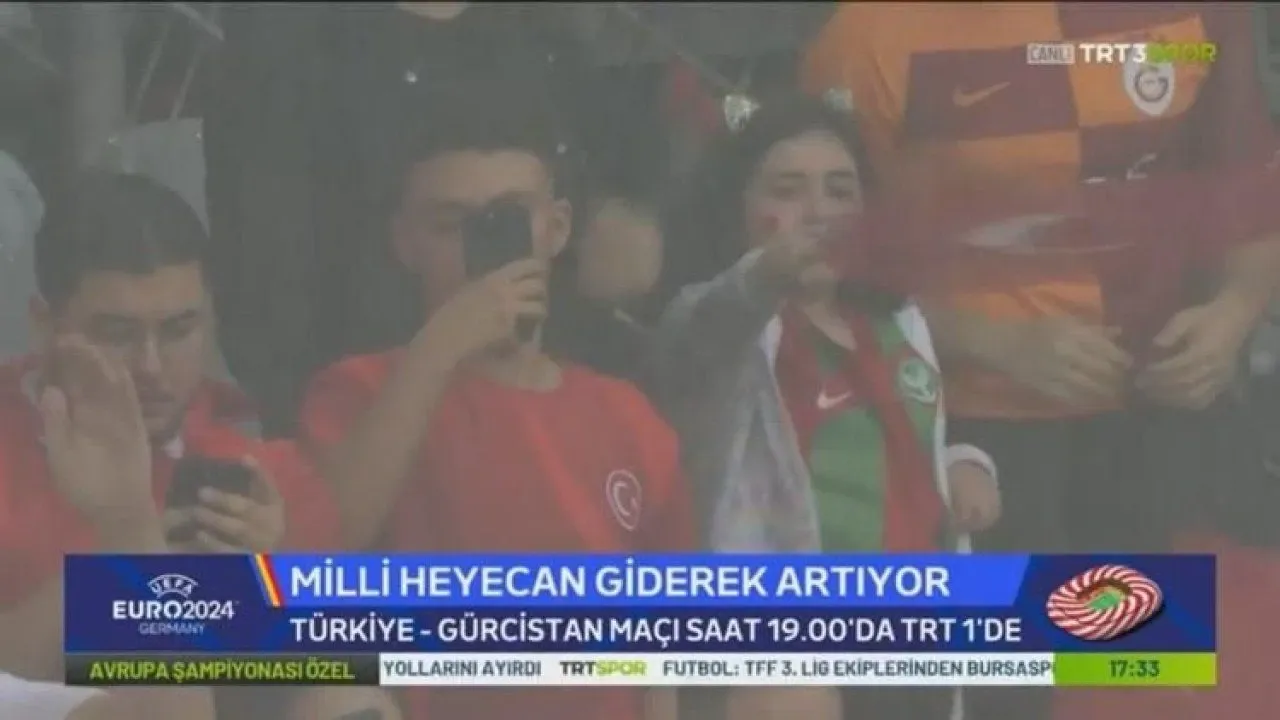 A young fan supports Turkey in an Amedspor jersey